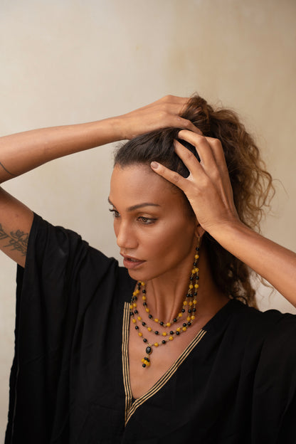 ritual black and gold kaftan with duo glam earring/necklace from unleash your inner wealth