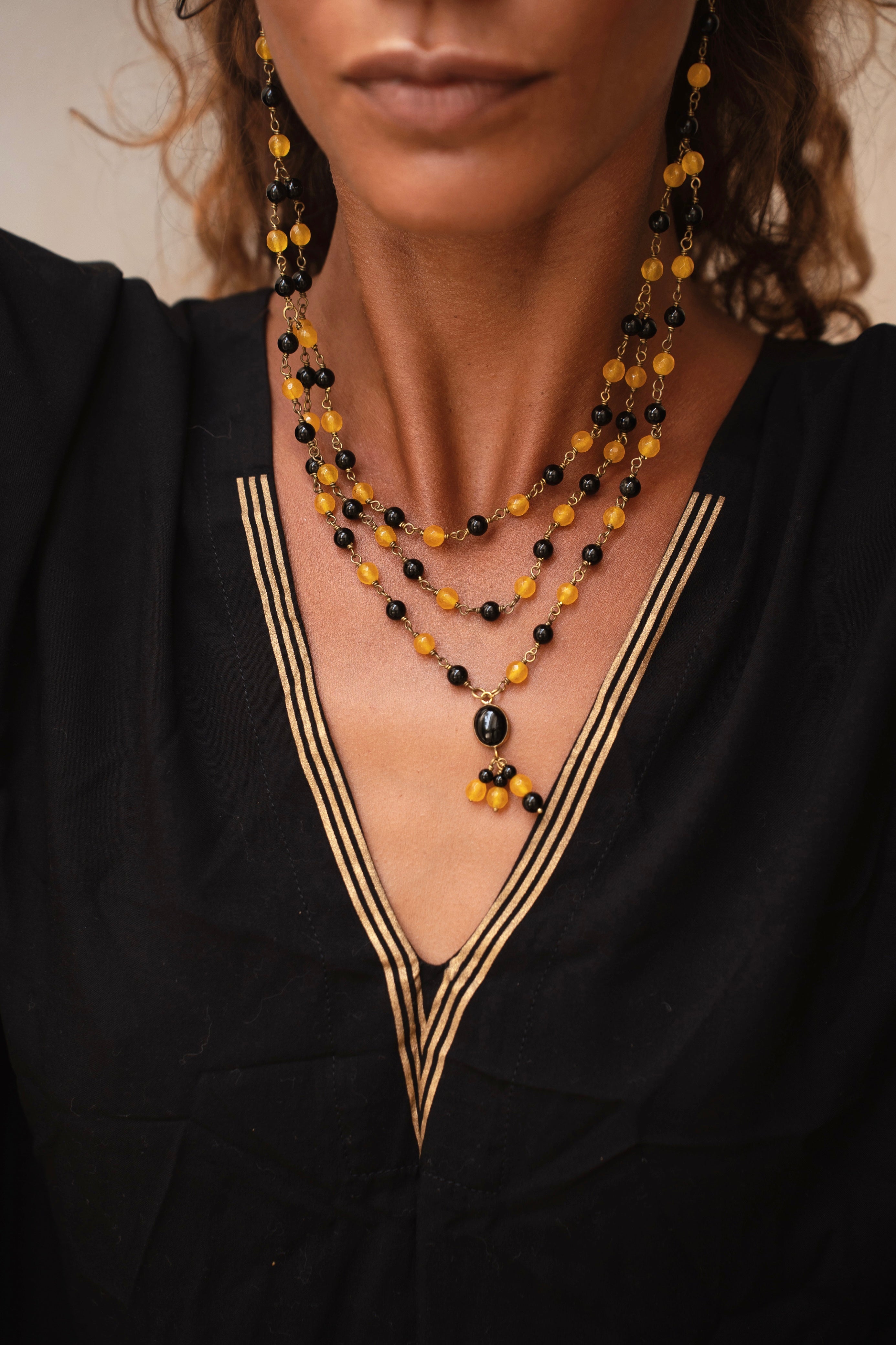 ritual black and gold kaftan with duo glam earring/necklace from unleash your inner wealth
