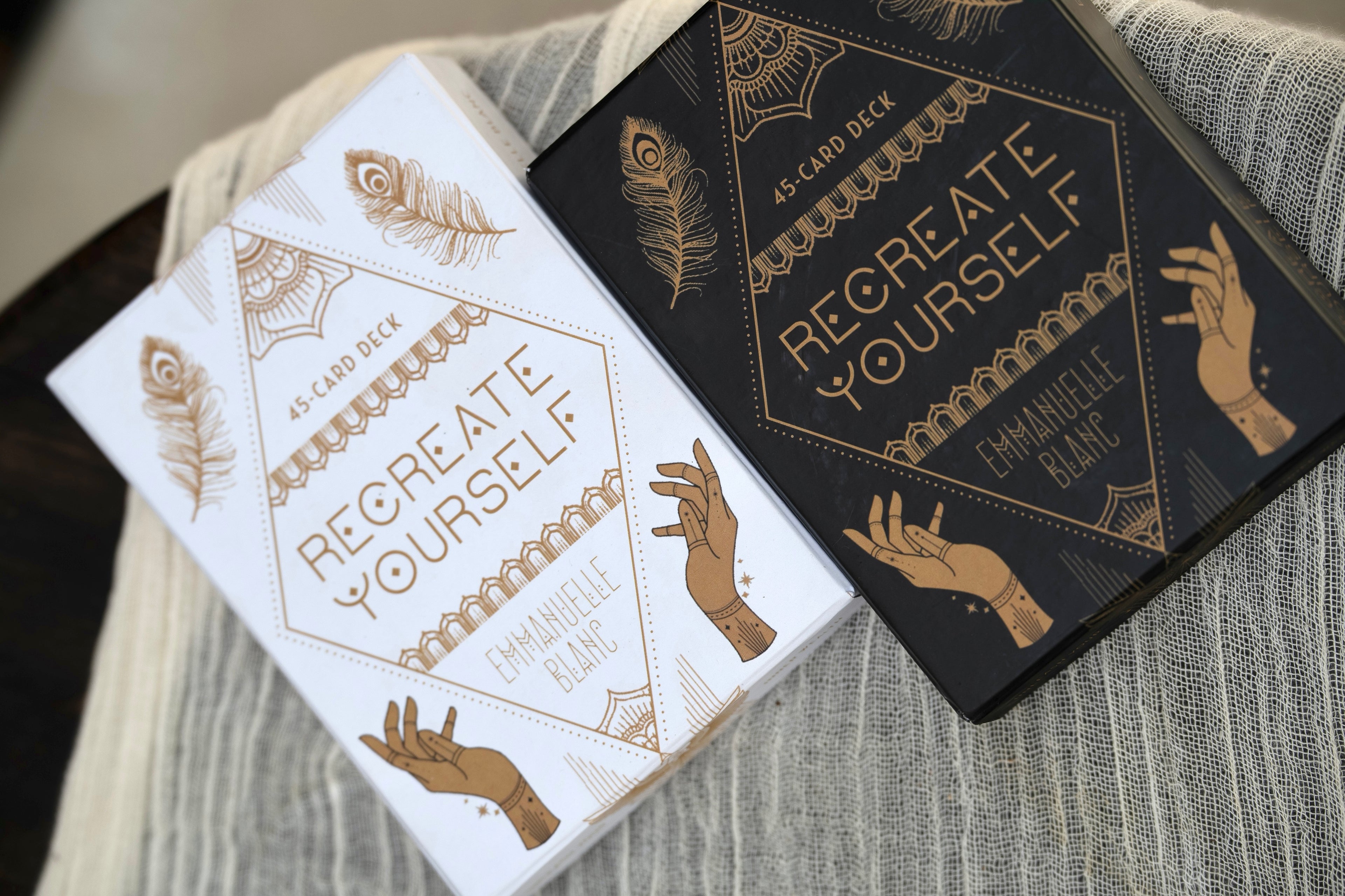 The Recreate Yourself 45-card deck comes in 2 colors, white and gold, black &amp; gold with guidebook