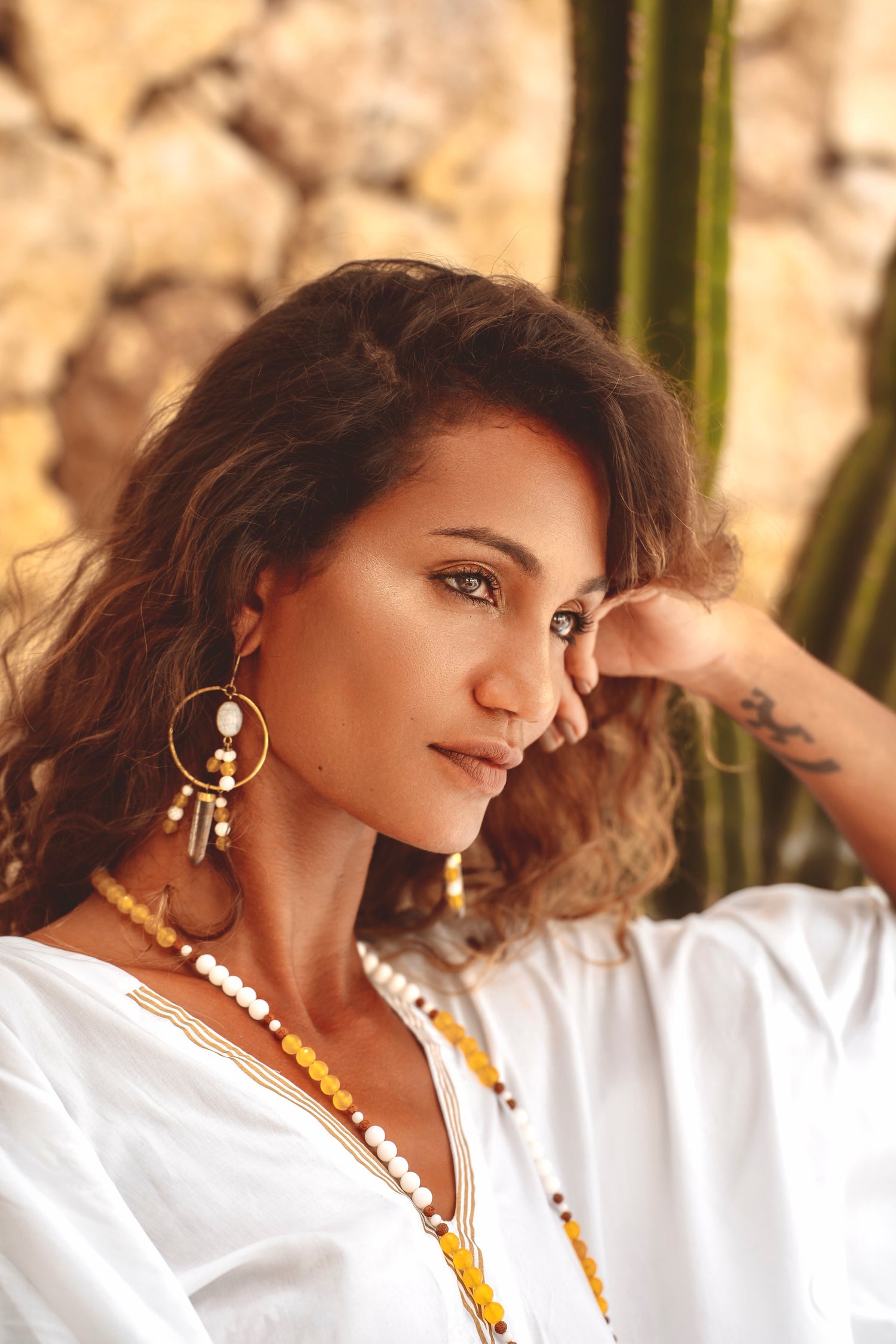 white and gold ritual kaftan phoenix rising with divine mala necklace and ring me earrings